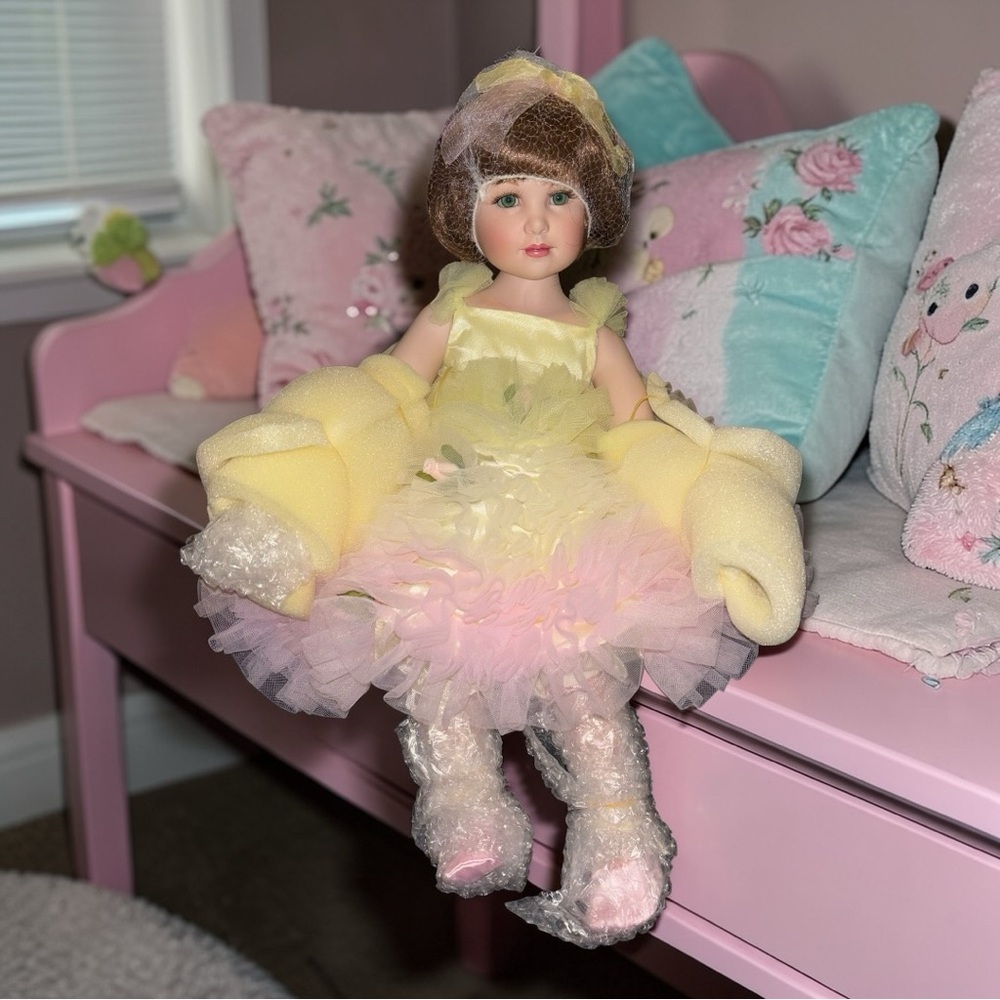 Peace" porcelain doll from the Marie Osmond "Coming Up Roses" Collection